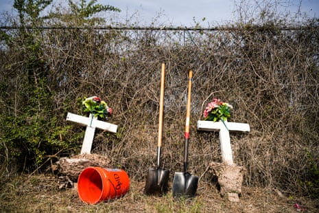 Headstones that marked unidentified migrant graves moved aside while Texas State University graduate students exhume bodies at La Grulla cemetery on December 17, 2019. 