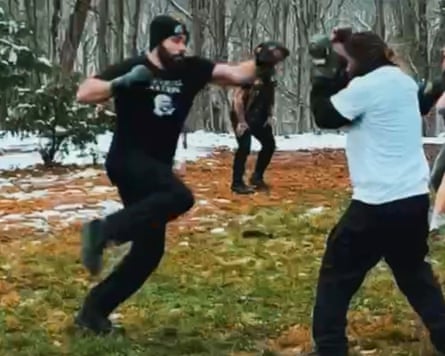 men fight each other