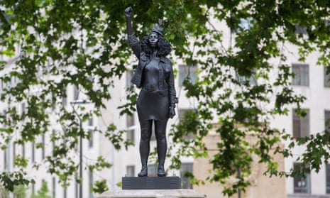 A sculpture of Jen Reid stands on the plinth previously occupied by slave trader Edward Colston in Bristol.