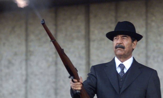 Former Iraqi president Saddam firing shots into the air in 2000. 