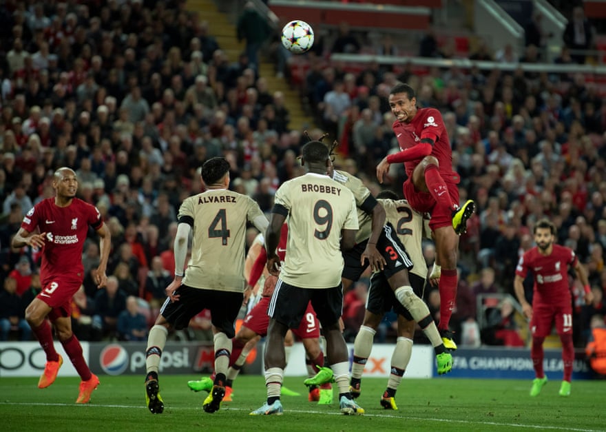 Joél Matip towers over the Ajax defence to make the difference.