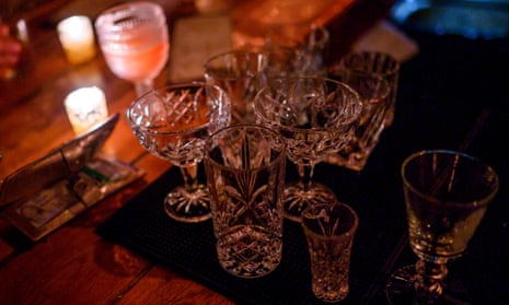 Cocktail glasses at a bar