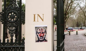 A poster at the gated entrance to Kensington Palace Gardens, where Roman Abramovich has a house.