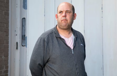 Stephen Bond, who is wearing a grey zip-up top