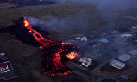 Home on fire as lava stream reaches them