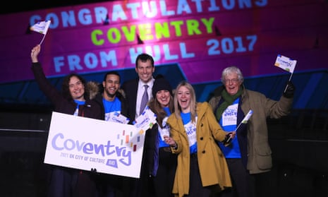 Arts minister John Glen, third left, with members of the winning Coventry bid team.