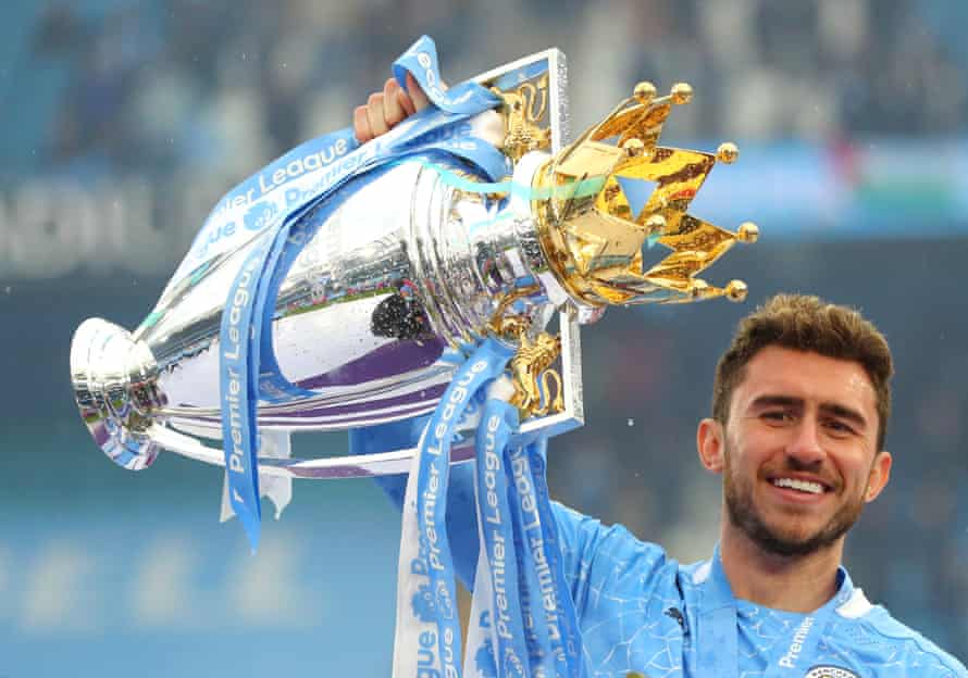 Aymeric Laporte: ‘Manchester City winning can annoy people, like our neighbours’ | Manchester City 3 Aymeric Laporte celebrates with the Premier League trophy last May.