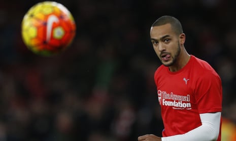 Theo Walcott warms up, possibly ahead of a move to Manchester City?