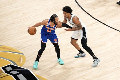 The Spurs' Dylan Harper plays defense on the Knicks' Jalen Brunson during Game 5 of the NBA finals.