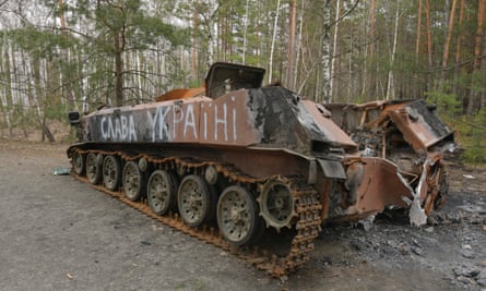 ‘Glory to Ukraine’ daubed on a burned-out Russian armoured vehicle in Chernobyl in April 2022.