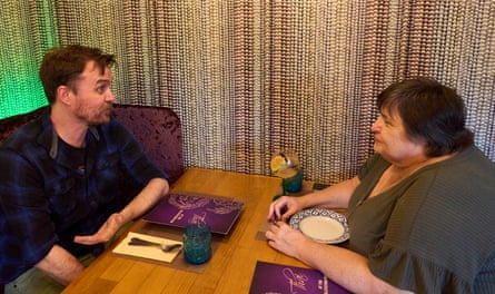 Keith and Amanda chatting across a restaurant table