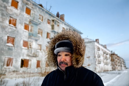 Karp, a coal miner, walks through Yor Shor, an abandoned village near Vorkuta where he is among the last ten inhabitants. Miners say that after ten years working underground it is impossible to remove black rings from around the eyes. Vorkuta is a coal mining and former Gulag town 1,200 miles north east of Moscow, beyond the Arctic Circle, where temperatures in winter drop to -50C. Here, whole villages are being slowly deserted and reclaimed by snow.