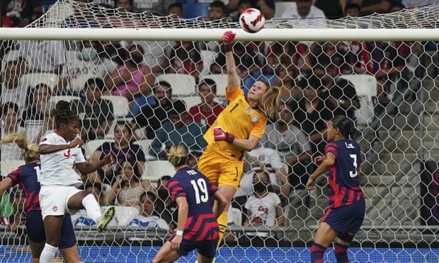 Alyssa Naeher, pictured with a clear hit against Canada in July, made the goalie spot her own.