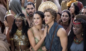 This image released by Lionsgate shows Courtney Eaton, center left, and Brenton Thwaites, center right, in a scene from “Gods of Egypt.” (Lisa Tomasetti/Lionsgate via AP)