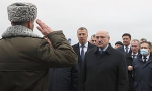 President Alexander Lukashenko taking a soldier's salute.