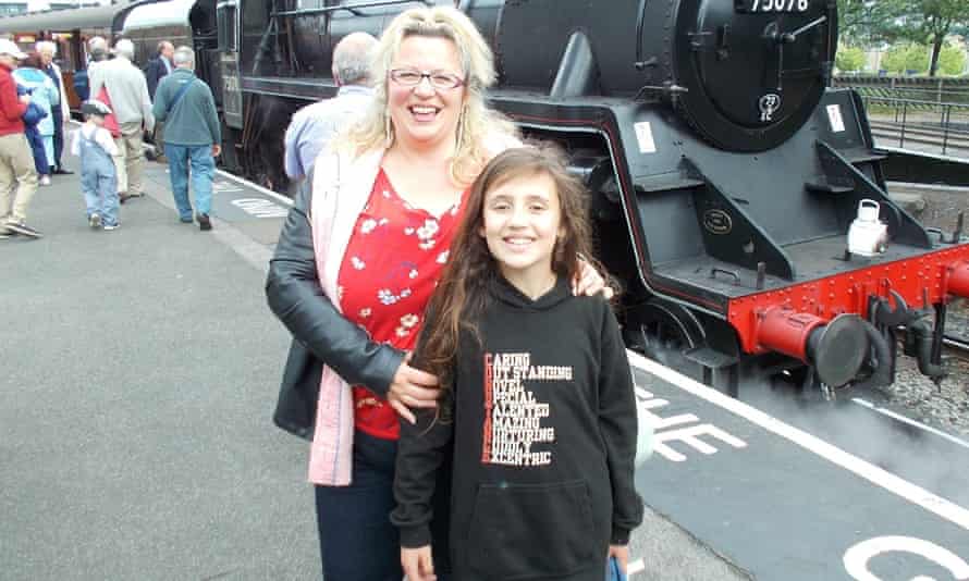 Constance Bailey and her mother Laura in front of a steam locomotive