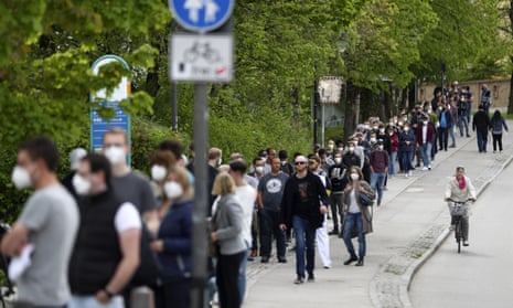 People queue at a vaccination centre in Ebersberg near Munich, Germany.