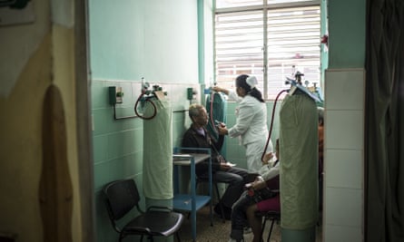 A nurse treats the patients at the 19 de Abril hospital, in Havana.