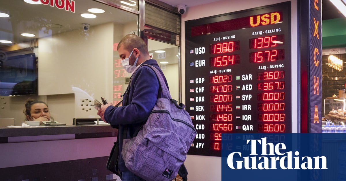 Turkey faces threat of financial crisis after lira plunges against dollar