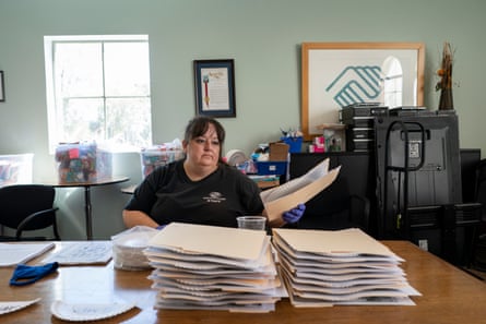 Priscilla prepares the ‘take-home packets’ at The Boys and Girls Club office for the kids to bring home for their online sessions she teaches from her apartment.