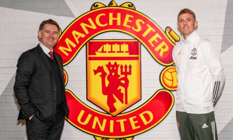 John Murtough and Darren Fletcher pose after being named football director and technical director of Manchester United.