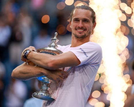 Alexander Zverev celebrates with the US Open trophy after beating Ben Shelton.