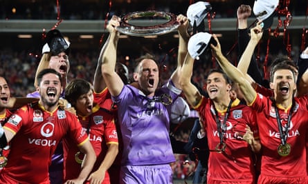 Adelaide United celebrate winning the championship