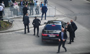 Security guards react at the scene of a shooting incident of Slovak PM Robert Fico.