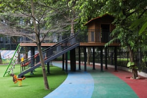 Playground on what looks like Astroturf
