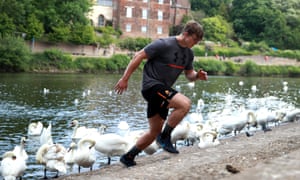 Ted Hill, the Worcester Warriors flank forward, works out on the banks of the River Severn in May.