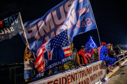 people wave big trump flags