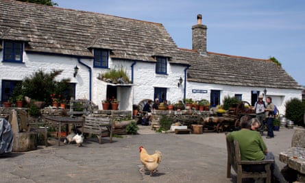 Square and Compass Village Pub with people and chickens outside, Worth Matravers, Dorset, England, UK