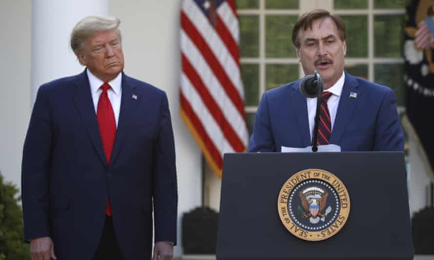 Lindell speaks as Trump listens during a Covid briefing in the Rose Garden at the White House in March 2020.