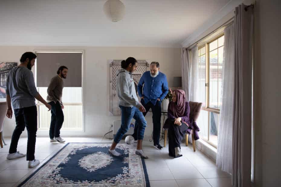 Sharon Hussein at home with her sons and her husband Ahmad. She says it’s important her family feel the spirit of Eid this week and connect with loved ones.