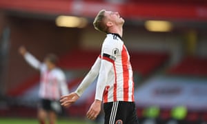 Oli McBurnie shows his frustration after a miss against West Ham