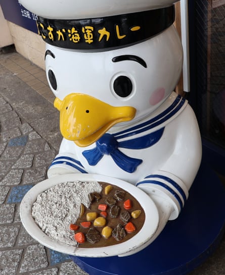 Sucurry, Yokosuka’s seagull mascot, greets visitors at the main railway station with a bowl of the city’s signature navy curry