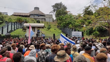 Protestors gather outside the parliament building in Honiara, Solomon Islands, November 24, 2021, in this screen grab obtained by Reuters, from a social media video. Georgina Kekea via REUTERS THIS IMAGE HAS BEEN SUPPLIED BY A THIRD PARTY. MANDATORY CREDIT.