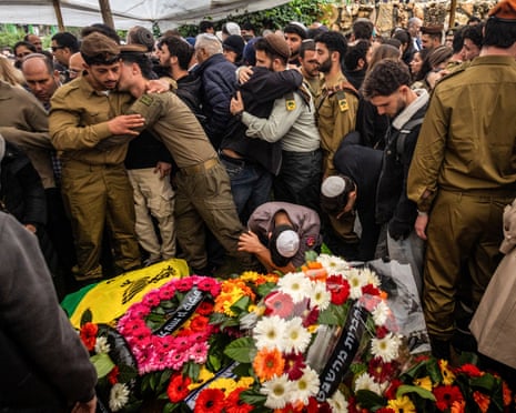 Mourners of an Israeli soldier killed in combat in southern Lebanon at his funeral in Jerusalem