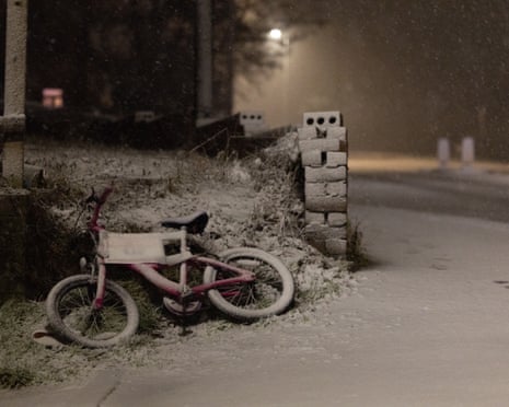 A snow-covered bike in Ruthin, Wales, Britain