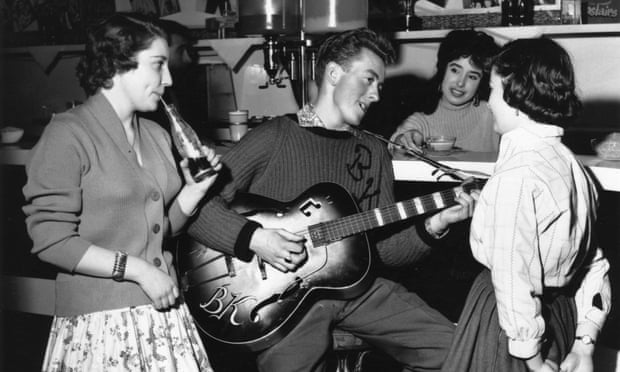 Singer and guitarist Bill Kent entertains teenage fans in The Two I’s Coffee Bar, Soho, 1958.