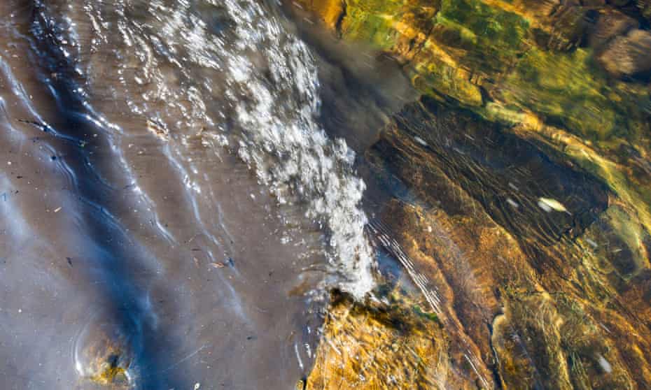 Raw sewage mixing with clean water in the river Kent, Cumbria: 'The government and the water companies cannot be trusted to ensure clean rivers.'
