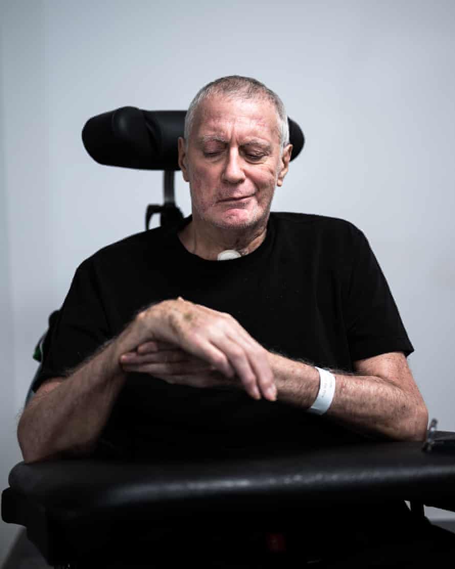 Geoff in wheelchair with unresponsive arm