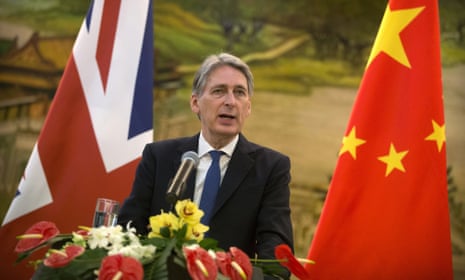 Philip Hammond speaking at a press conference in Beijing