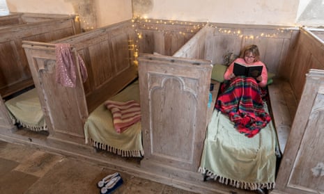 A guest gets cosy in Holy Sepulchre church in Warminghurst, West Sussex.