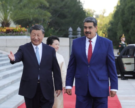 Nicolás Maduro with Xi Jinping on a red carpet
