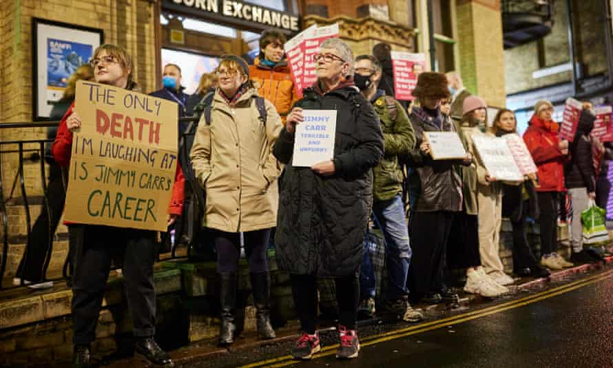 Protesters against Jimmy Carr outside the Corn Exchange in Cambridge.