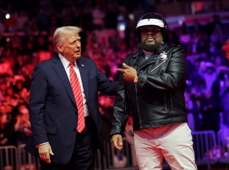 Victor Willis, right, with Donald Trump in 2025. He originally opposed Trump’s use of YMCA, but changed his mind as he realised it was ‘good for business’.