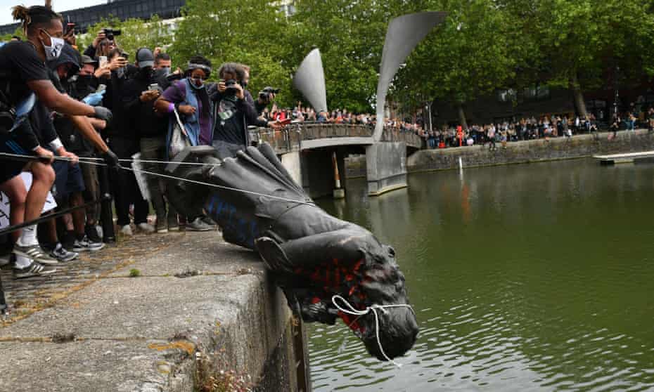 The statue of Edward Colston is deposited in Bristol harbour during a Black Lives Matter protest in June 2020.