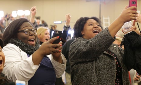 Doug Jones supporters celebrate at his election party.