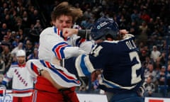 The Columbus Blue Jackets’ Mathieu Olivier (right) trades blows with Matt Rempe in a game last month